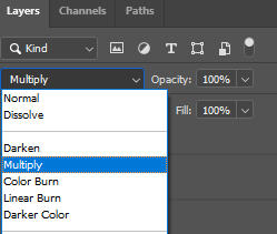 With the tattoo layer selected, just under the layers tab is a 'Blender' drop down that is defaulted to 'Normal'. Scroll down and select 'Multiply'.