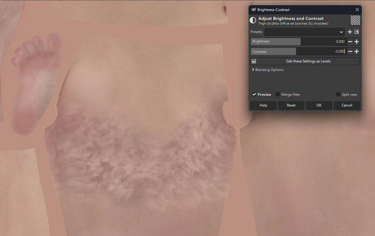 Bringing the contrast down will make it look more faded and healed. (You can also decrease the opacity of the layer for a more faded effect)
